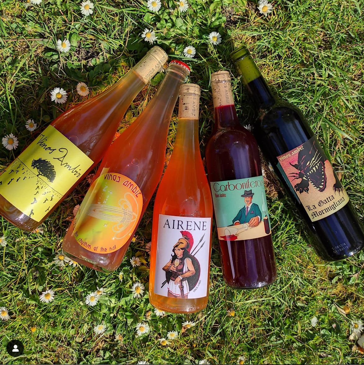 La Producteria. Contact page. Natural Wines Bottles on the grass